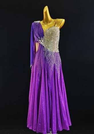 A stunning fuchsia silk waltz ballroom dress, perfect for competition. The one-shoulder design and shimmering embellishments ad