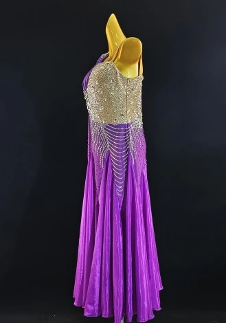 A stunning fuchsia silk waltz ballroom dress, perfect for competition. The one-shoulder design and shimmering embellishments ad