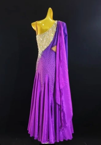 A stunning fuchsia silk waltz ballroom dress, perfect for competition. The one-shoulder design and shimmering embellishments ad