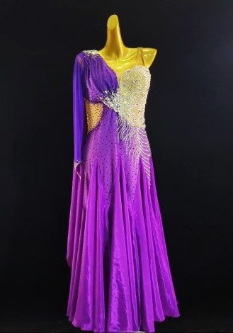 A stunning fuchsia silk waltz ballroom dress, perfect for competition. The one-shoulder design and shimmering embellishments ad