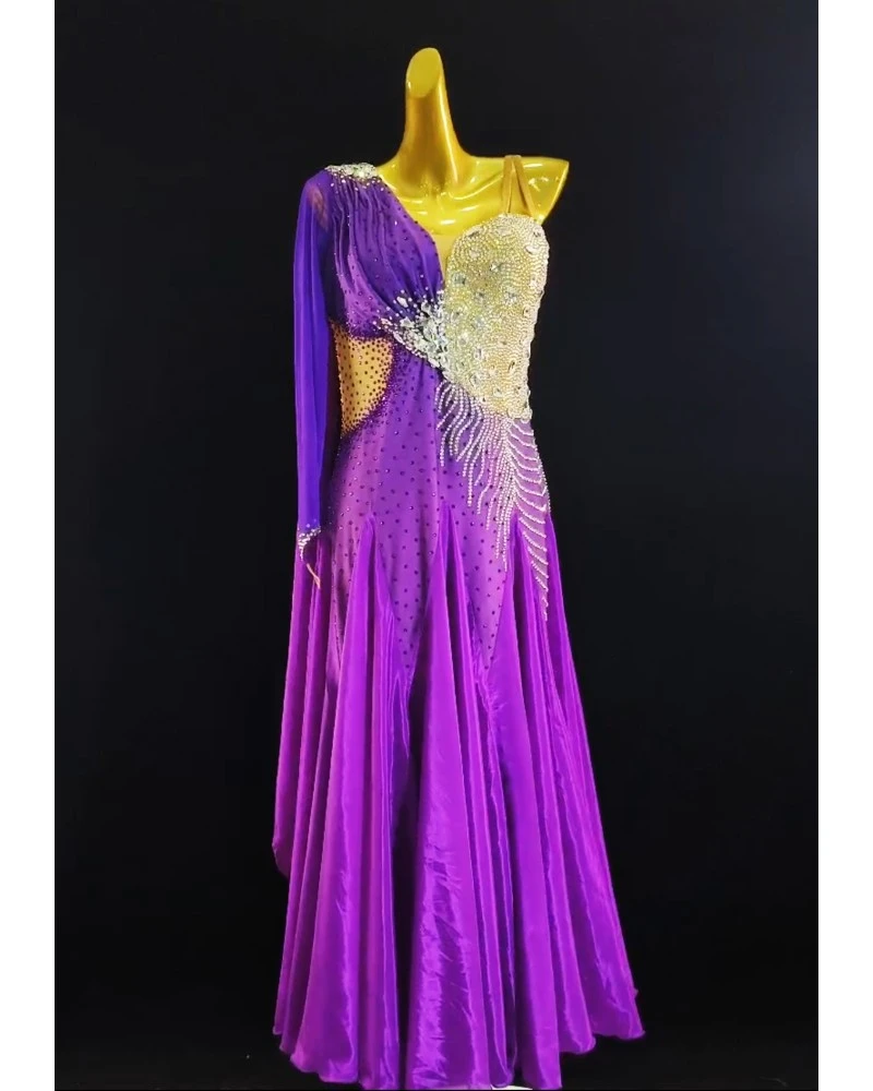 A stunning fuchsia silk waltz ballroom dress, perfect for competition. The one-shoulder design and shimmering embellishments ad A stunning fuchsia silk waltz ballroom dress, perfect for competition. The one-shoulder design and shimmering embellishments ad