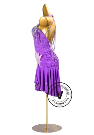 This dazzling purple dance dress is perfect for Cha-Cha, Salsa, Rumba, and other Latin rhythms. The intricate beading and asymm