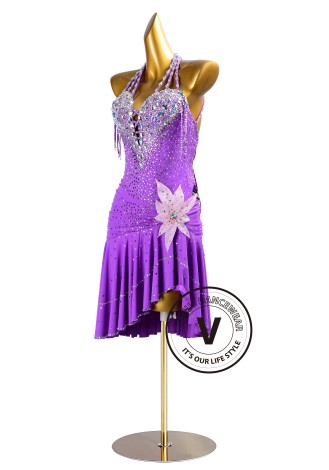 This dazzling purple dance dress is perfect for Cha-Cha, Salsa, Rumba, and other Latin rhythms. The intricate beading and asymm