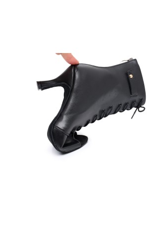 Elegant black Latin rhythm dance shoes with lace-up detailing. Perfect for the dance floor.