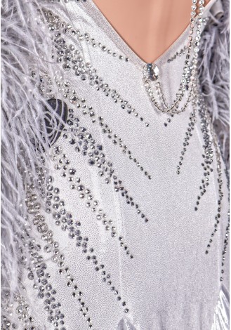 A stunning silver ballroom dance gown, adorned with shimmering embellishments and a dramatic feather boa.