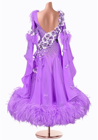 A stunning lavender ballroom dance gown adorned with delicate feather accents and shimmering embellishments. Perfect for a capt