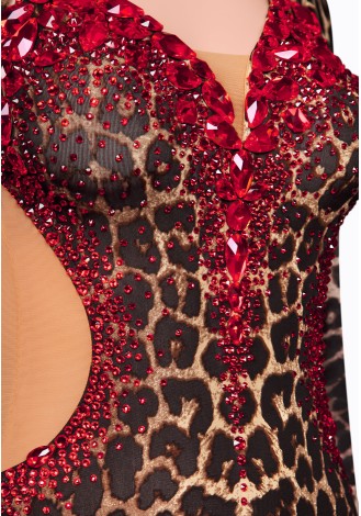 A stunning ballroom dance gown in a leopard print with red accents and feather details.