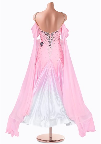 A stunning pink and white ballroom dance gown, perfect for a graceful performance. The shimmering bodice and flowing skirt crea