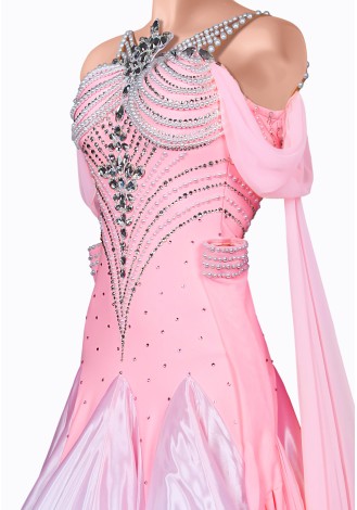 A stunning pink and white ballroom dance gown, perfect for a graceful performance. The shimmering bodice and flowing skirt crea