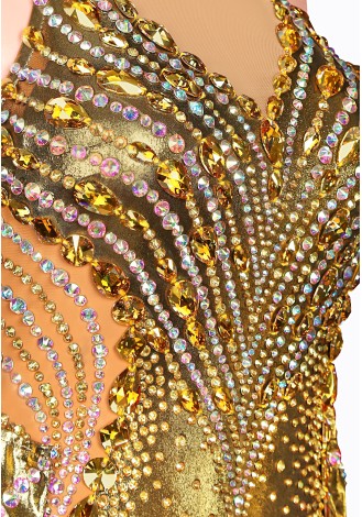 Shine bright on the dance floor in this stunning gold ballroom gown. The intricate beading and shimmering fabric create a breat