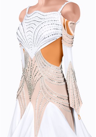 Shine bright on the dance floor in this stunning ballroom gown. The intricate beading and flowing skirt create a breathtaking l