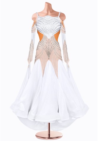 Shine bright on the dance floor in this stunning ballroom gown. The intricate beading and flowing skirt create a breathtaking l