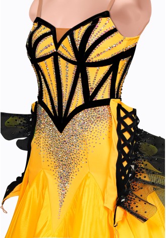 Shine bright in this stunning yellow ballroom dance gown. The black bodice and dramatic sleeves add a touch of elegance.