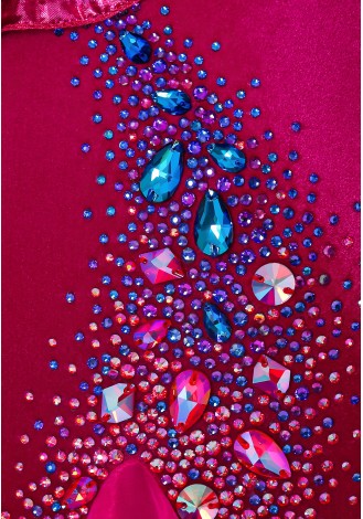 A dazzling fuchsia ballroom dance gown, adorned with feathers and shimmering crystals. The off-the-shoulder design and flowing 