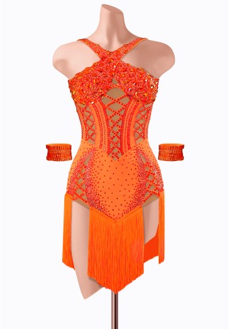 Vibrant orange Latin dance dress with intricate beading and fringed skirt. Perfect for a fiery performance.