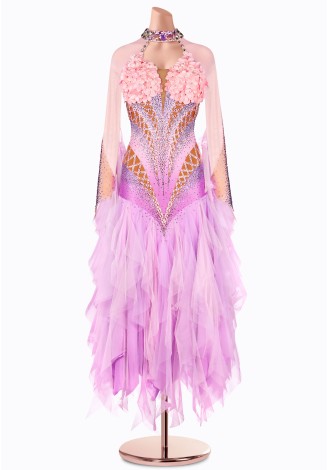 A breathtaking lavender ballroom dance gown adorned with delicate pink floral accents. The intricate design and flowing skirt c