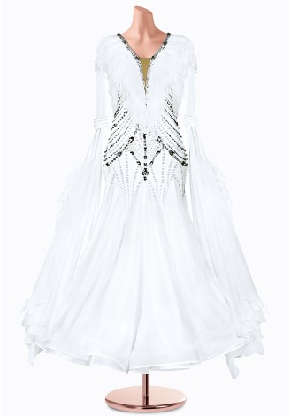 A stunning white ballroom dance gown with intricate beading and feather accents. The elegant design is perfect for a graceful p