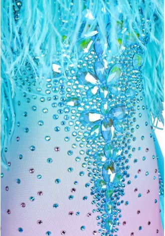 A stunning ombre ballroom dance gown in shades of pink and turquoise, accented with a beautiful feather boa and sparkling embell