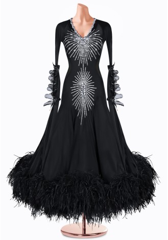 Elegant black ballroom dance gown with silver embellishments and feather trim.